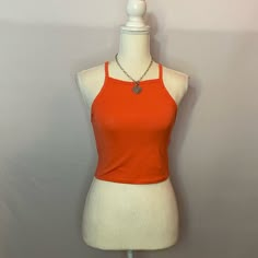 Orange Cropped Tank Top *From A Pet And Smoke Free Home. T2 Solid Color Y2k Tank Top For Summer, Y2k Style Solid Color Tank Top For Summer, Summer Workout Camisole Tops, Orange Sleeveless Top For Workout, Stretch Racerback Tops For Summer, Orange Sleeveless Workout Tops, Casual Orange Tank Top For Workout, Casual Orange Workout Tank Top, Casual Stretch Racerback Top