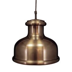 a large metal light hanging from the ceiling