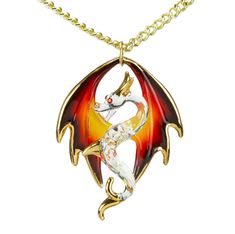 Dragon Necklace See how glass turns into an exciting dragon necklace, ready to amaze and inspire. Handcrafted Dragon Pendant: This pendant is carefully made by hand, featuring the detailed design of a majestic dragon. 18" Gold Plated Chain: It hangs from an 18-inch chain plated with gold, adding durability and a luxurious shine to your necklace. Decorated with Genuine Crystals, Real 22k Gold, and airbrushing: The pendant sparkles with genuine crystals, real 22k gold, and delicate airbrushing, cr Collectible Fantasy Jewelry With Dragon Design, Fantasy Dragon Design Jewelry For Collectors, Gold Fantasy Necklace With Dragon Design, Gold Fantasy Dragon Necklace, Fantasy Dragon Design Necklace, Gold Fantasy Jewelry With Dragon Design, Fantasy Gold Jewelry With Dragon Design, Unique Dragon Design Necklace Collectible, Unique Dragon Design Necklace For Collectors