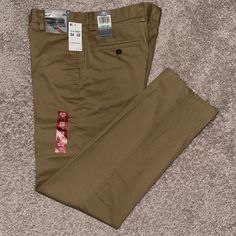 Brand New Docker Slim, Flat Front Pants Fitted Khaki Cargo Pants With Welt Pockets, Khaki Tapered Leg Dress Pants With Pockets, Fitted Khaki Work Pants With Pockets, Khaki Dress Pants With Tapered Leg And Pockets, Fitted Khaki Work Pants, Fitted Full-length Khaki Work Pants, Fitted Khaki Work Pants With Tapered Leg, Utility Pants Men, Black Khaki Pants