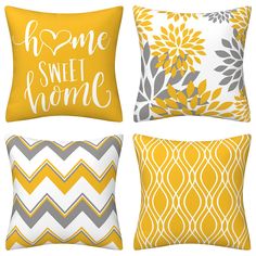 four yellow and gray pillows with the words home, sweet home on each pillow cover