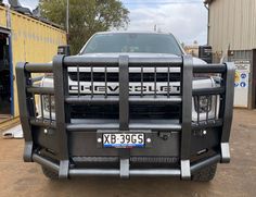 the front end of a truck parked in a lot