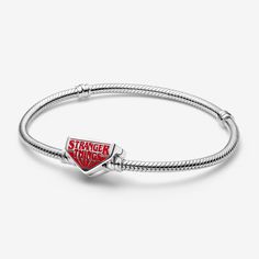 Celebrate loyalty, friendship and your love of Hawkins, with this exclusive Pandora x Stranger Things snake chain bracelet. Designed with a clasp engraved with "FRIENDS DON'T LIE" on one side, and the Stranger Things logo on the other, fill this meaningful piece with your favourite symbols and characters. - Pandora Stranger Things Clasp Snake Chain Bracelet - Enamel / Sterling silver / Red - Sz. 6.7 in Loyalty Friendship, Stranger Things Logo, Pandora Essence, Bracelet Tennis, The Stranger, Snake Chain Bracelets, Bracelet Cuir, Halloween Jewelry, Snake Chain