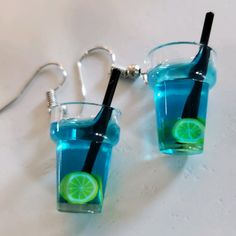 Blue Hawaii Drink With Lemon Slice Dangle Earrings Super Fun & Cute Dangle Earrings Made To Look Like Mini Drink Cups With Little Black Straw In Each Cup. Brand New In Original Packaging. These Resin Drink Earrings Are Made Of Eco-Friendly Acrylic Material, Non-Toxic And Safe, Durable And Lightweight. Bundle To Save! Fun Blue Summer Jewelry, Fun Blue Jewelry For Summer, Blue Fun Dangle Jewelry, Fun Blue Dangle Jewelry, Blue Fun Drop Earrings, Fun Blue Drop Earrings, Blue Drop Earrings Fun Style, Blue Dangle Jewelry With A Fun Style, Casual Blue Earrings For Beach