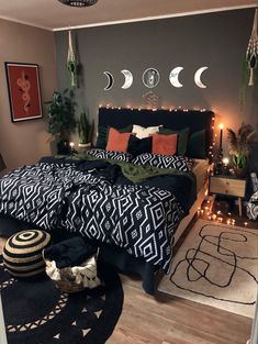 a bed room with a neatly made bed and decorations