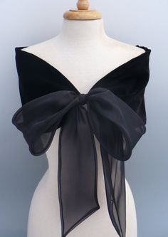 Black velvet stole tied with black organza bow. The velvet is rayon and the bow is nylon organza. Very elegant yet simple and easy to wear. Does need to be dry cleaned. The small size is, 38 long between the bow and 8 wide. Medium, is 40 x 8 wide. Large, 42x 8 Extra Large, 44 x 8 Over time this Umgestaltete Shirts, Áo Blu, Detail Couture, Mode Prints, Evening Wraps, فستان سهرة, Fashion Details, A Dress, Shawls And Wraps