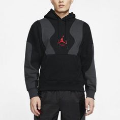 The Air Jordan x OFFWHITE Crossover Pullover Black is a stylish and versatile piece of apparel. Crafted from a blend of cotton and recycled polyester, this pullover features the signature Off-White logo in handwritten form on the Jumpman ™️ pocket. The back closure is a combination of the Off-White and Jordan "wings" logo. The classic gray and white "shoelace" replaces the drawstring on the hood. Perfect for everyday wear, this pullover is sure to be a staple in any wardrobe. It is part of the A Functional Crew Neck Hoodie For Streetwear, Winter Athleisure Sweatshirt With Logo, Urban Cotton Hoodie With Logo Detail, Urban Cotton Hoodie With Logo, Functional Cotton Hoodie For Streetwear, Urban Crew Neck Hoodie With Logo Detail, Urban Hoodie Sweatshirt With Logo, Functional Streetwear Sweatshirt With Ribbed Cuffs, Black Cotton Hoodie With Logo