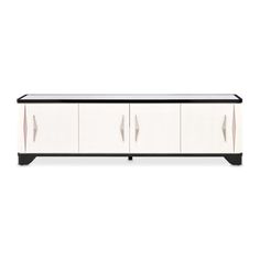 a white and black sideboard with three doors