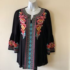 Beautiful Embroidered Black Top. Made Of 100% Rayon Black V-neck Blouse With Floral Embroidery, Black Embroidered Tops For Summer, Black Top With Intricate Embroidery, Black Summer Tops With Intricate Embroidery, Black Tops With Intricate Embroidery For Summer, Black Embroidered Top For Spring, Black Long Sleeve Embroidered Top With Floral Print, Black Bohemian Top With Embroidered Sleeves, Bohemian Black Tops With Embroidered Neckline