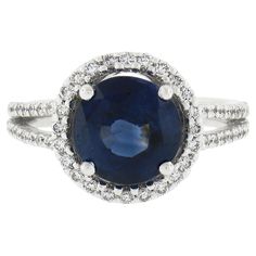 an oval blue sapphire and diamond ring