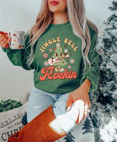 Jingle Bell Rockin Sweatshirt - Christmas Tree Sweater - Music Lover Christmas Shirt - Christmas Music Hoodie - Funny Christmas Shirt How can I order? 1️) Please review all the information provided before placing an order 2️) Select the shirt type and size. 3️) Select the color of the shirt using the following options. 4️) Please add the vinyl color (white or black) in the optional message section of the order. 5️) Need more Items? Add the current item in the cart. And If you like to add more items to your order please press the back button and repeat steps 1-4 again. 6️) Once all your desired items are in your cart you may complete your order by entering your payment method, desired shipping address and click submit. When will my product arrive? Processing Time: 1-3 days During holidays p Casual Christmas Cotton Hoodie, Casual Cotton Christmas Hoodie, Casual Green Christmas Sweatshirt, Casual Christmas Hoodie With Crew Neck, Casual Christmas Cotton Sweatshirt, Casual Cotton Christmas Sweatshirt, Christmas Tree Sweater, Gigi Shirts, School Sweatshirts