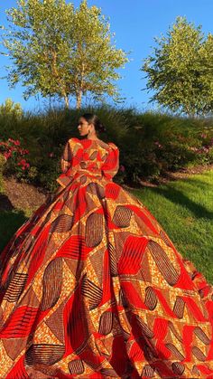 This design is made to order Mesmerize everyone with this vibrant African print ball gown. It is an eye-catching gown that makes this a standout piece for any event. Ankara Ball Gown Styles, Lobola Dresses, African Formal Dress, African Print Wedding Dress, Ankara Prom Dress, African Gowns, South African Traditional Dresses, African Bridal Dress, Nigerian Outfits