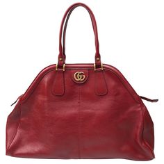 Gucci Red Marmont Re(Belle) Handbag. This beautiful Gucci handbag is in excellent condition. It has no sign of use and has the care card with a color swatch in the pocket. It is a large bag with a deep red leather material. There is gold hardware with a gold "GG" on one side and a gold Tiger head on the other side. It has a gold zipper going across the top with two top handles. This piece is the perfect addition to any summer outfit and has plenty of room on the inside for storage of items. Meas Red Gucci Bag, Painted Handbag, Expensive Bag, Gold Tiger, Vintage Tote Bag, Gucci Handbag, Italian Bags, Gucci Jewelry, Gucci Marmont