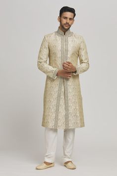 Ivory sherwani with floral embroidery. Paired with an inner kurta and pyjama. - Aza Fashions Ivory Sherwani, Embroidered Sherwani, Embroidery Floral, Cotton Embroidery, Aza Fashion, Full Sleeve, Floral Embroidery, Stand Collar, Destination Wedding