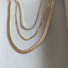 Simple and elegant in design, this gold filled necklace is a perfect addition for someone looking for a dainty gold necklace to add to their daily rotation. Pair with a pendant, beaded necklace, or STACK with the essential stack. Minimalist Gold Plated Double Chain Charm Necklace, Delicate 14k Gold Filled Charm Necklaces For Layering, Layering 14k Gold-filled Double Chain Necklace, 14k Gold Filled Double Chain Necklace, Dainty Gold Herringbone Necklace With Delicate Chain, Gold Double Chain Charm Necklace For Everyday, Gold-plated Charm Necklaces For Layering, 14k Gold Filled Double Chain Necklaces For Layering, Dainty Gold Chain Herringbone Necklace For Everyday