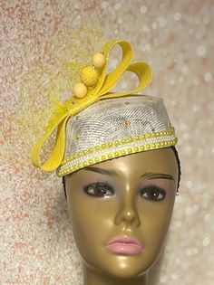 Yellow and White Beaded Fascinator Half Hat, Church Head Covering, Headwear, Tea Parties, Weddings, and other Special Occasions Teardrop Length: approximately 7 inches Width: approximately 5 inches (inches from the widest part) The hat pin may vary and is for decorative purposes only and not to be used to hold hat to the head. The hat is affixed to the head via a hat string. Handmade gifts for women: wife, mother, sister, daughter or girlfriend. SHIPPING All items for free shipping will be shipped via USPS FIRST CLASS MAIL. Adjustable Beaded Headpiece For Wedding, Wedding Headband With Bead Caps, Elegant Bead Cap Headband, Adjustable Beaded Wedding Headpieces, Adjustable Cloche Hat For Ceremony, Adjustable Cloche Hats For Ceremonies, Elegant Bead Caps Headpieces For Evening, Beaded Fitted Headpieces For Party, Yellow Headband For Summer Wedding