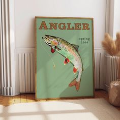 an angler sign with a rainbow colored fish on it in front of a white wall