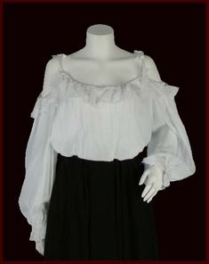 a woman's white blouse and black skirt