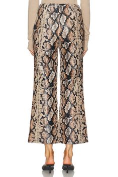 100% polyester.  Made in China.  Hand wash.  Hidden side zipper closure.  Faux leather.  .  .  .  .  .  .  .  .  .  .  . Snake Pants, Statement Pants, Snake Pattern, Simon Miller, Snake Patterns, Patterned Vinyl, Vinyl Fabric, Downtown Los Angeles, Snake Print