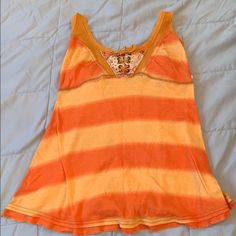 Orange And Yellow Free People Racer Back Tank Top. New With Tags. Size Small 100% Cotton Yellow Tank Top For Spring Vacation, Yellow Tank Top For Vacation And Spring, Yellow Tank Top For Vacation In Spring, Fitted Yellow Tank Top For Beach Season, Yellow Tank Top For The Beach, Yellow Beach Tank Top, Trendy Yellow Tank Top For Vacation, Yellow Cotton Tank Top For Spring, Mustard Tank Top For Spring