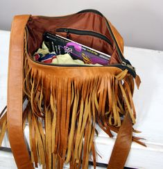 Fringe leather bag, Bohemian Fringe bag, Festival leather fringed purse, Leather woman handbag, Yellow distressed crossbody bag. Cowboy boho-style handbag for people who want a casual style handmade from distressed leather. This crossbody bag is the perfect size to carry your daily essentials in style! It is made from high quality italian leather. The purse (flap in a purse) may differ slightly depending on the edge of the leather. This leather bag is a perfect everyday bag! There is a lot of sp Fringe Pouch Bag For Everyday Use, Travel Fringe Pouch Shoulder Bag, Rectangular Travel Satchel With Tassels, Travel Shoulder Bag With Fringe And Pouch Shape, Travel Shoulder Bag With Fringe In Pouch Shape, Everyday Pouch Bag With Tassels, Brown Tassel Bags For Daily Use, Leather Fringe Pouch Bag, Brown Fringe Shoulder Bag For Daily Use