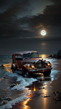 an old car is parked on the beach at night with the moon in the background