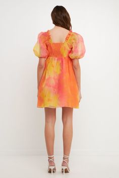 Stand out at your next special event in this stunning tie-dye baby-doll dress. This mini length dress is perfect for showing off your curves. With puff sleeves and shirring detail, this dress is sure to turn heads. The sweetheart neckline gives it a glamorous touch, while the invisible zipper closure makes it easy to wear. Mini length Puff sleeves Tie-dye print Shirring detail Baby doll fit Invisible zipper closure Sweetheart neckline Hand wash cold Do not bleach Do not tumble dry Iron low Shell Summer Mini Puff Sleeve Dress With Smocked Back, Summer Puff Sleeve Mini Dress With Smocked Back, Summer Mini Length Puff Sleeve Dress With Smocked Back, Summer Smocked Mini Dress With Puff Sleeves, Summer Puff Sleeve Smock Mini Dress, Summer Smock Mini Dress With Puff Sleeves, Summer Flowy Ruched Puff Sleeve Dress, Summer Flowy Puff Sleeve Dress With Ruched Detail, Multicolor Ruched Puff Sleeve Dress