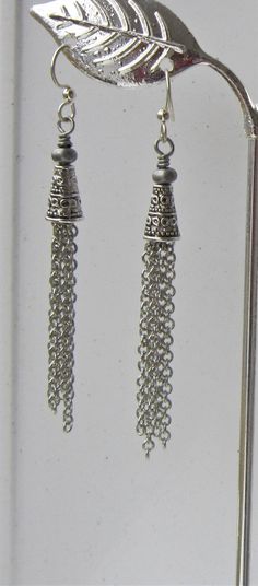 Long Tassel Earrings ~ These stunning chain dangle earrings are made with varying lengths of antiqued silver chain to give them a vintage feel. These long chain earrings are my go-to earrings ~ they match everything! Makes a great gifts for her! The chandelier earrings measure 2.75" from the top of the earwires to the bottom of the longest chain. Coordinating tassel necklace also available for sale.Goth Earrings will be packaged on an earring card in a lovely organza bag; along a note card indic Metal Tassel Drop Earrings For Pierced Ears, Adjustable Silver Tassel Earrings For Party, Elegant Silver Tassel Earrings Nickel Free, Elegant Silver Tassel Earrings With Dangling Beads, Elegant Silver Nickel-free Tassel Earrings, Silver Nickel-free Drop Tassel Earrings, Metal Long Drop Earrings With Adjustable Chain, Silver Dangle Tassel Earrings For Pierced Ears, Silver Metal Tassel Earrings Gift