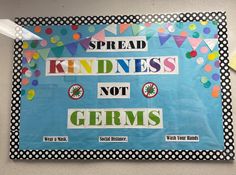 a bulletin board that says spread kindness not germs with polka dots on it