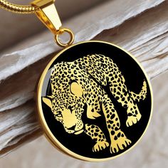 Unique Personalized Leopard Necklace!  Great idea as an animal lover gift ➜ Our patent-pending jewelry is made of high quality surgical steel with an 18k gold finish option. ➜ Our jewelry is personalized in the U.S.A by awesome working moms just like yours! We hire and train working mothers and pay a living wage. We are proud to support strong communities and keep jobs in America! This Jaguar Necklace Is the Perfect Keepsake! Whether for Yourself or a Loved One. ➜ If the custom engraving option is available, engrave onto the back of the pendant your loved one's name, your wedding date, an anniversary, or anything else you want to remember and keep you close to her heart. Each personalized piece offers exceptional craftsmanship that is fit to be an instant classic in your family. We Offer a Gold Animal Design Necklace For Gift, Gold Necklace With Animal Design For Gift, Leopard Jewelry, Leopard Necklace, Luxury Necklace, Working Mother, Working Moms, Circle Pendant, An Animal