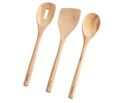 three wooden utensils are lined up in a row