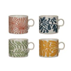 four different colored coffee mugs with leaves on them