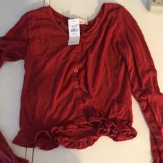 Dark Red Slightly Cropped. Never Been Worn Before! Super Cute And Can Be Dressed Up Or Down. Super Soft Material Casual Red Long Sleeve Blouse, Red Crew Neck Blouse For Fall, Casual Red Tops For Fall, Casual Fitted Red Long Sleeve Top, Red Stretch Long Sleeve Shirt, Casual Red Tops For Spring, Red Stretch Crew Neck Blouse, Casual Red Button-up Top, Casual Red Long Sleeve Top For Spring