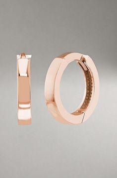 Versatile 10mm square tubes are polished to a high shine in these classic women's huggie earrings. Fashioned in 14K rose gold, the earrings secure in place with hinged backs. Luxury Rose Gold Huggie Earrings For Formal Occasions, Rose Gold Polished Finish Hoop Earrings For Formal Occasions, Rose Gold Polished Hoop Earrings For Formal Events, Classic Rose Gold Earrings With Shiny Finish, Rose Gold Polished Finish Formal Hoop Earrings, Formal Rose Gold Hoop Earrings With Polished Finish, Classic Shiny Finish Rose Gold Earrings, Modern Rose Gold Earrings For Everyday Luxury, Luxury Shiny Finish Huggie Earrings For Formal Occasions