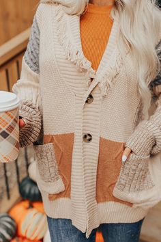 -Grab your pumpkin spice, and feel luxurious and nice! - Knit patchwork of various textures and colors - V-neck cut with fringe detail - Two button closures - Long sleeves with ribbed cuffs -Two functional front pockets - Straight hemline - Relaxed silhouette Measurements S-M : Bust 48", Hip 46", Length 26", Sleeve Length 20.5", Waist 48". M-L : Bust 50", Hip 48", Length 26.5", Sleeve Length 21", Waist 50". Beige Fringe Cardigan For Fall, Fall Beige Fringe Cardigan, Fall Cream Patchwork Sweater, Knit Patchwork, Impressions Online Boutique, Women Clothing Boutique, Online Womens Clothing, Distressed Jeans, High Waist Jeans