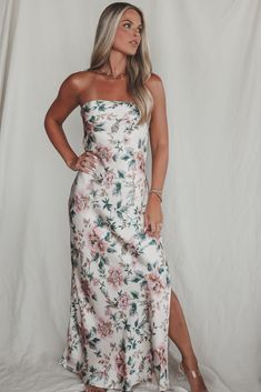 Bestieeee you look good so obviously all eyes on you! Pair with a pretty neutral heel or make it fun with a pink or green pop or color! Ivory satin strapless maxi dress, pretty pink and green floral print, side side, dress is lined Material is Polyester Hang to dry ‘Model is 5’7 wearing a small SHOP THE LOOK Small Medium Large Length 50’ 51’ 52’ Bust 14.5’ 15.5’ 16.5’ Feminine Strapless Dress For Spring Garden Party, Feminine Satin Strapless Summer Dress, Spring Floral Print Strapless Prom Dress, Spring Prom Strapless Dress With Floral Print, Spring Prom Strapless Floral Dress, Chic Pink Strapless Maxi Dress, Feminine Strapless Midi Dress For Spring, Feminine Strapless Dress For Summer Brunch, White Strapless Dress For Summer Prom