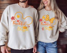 Mickey Minnie Thankful Grateful Blessed Shirt, Thanksgiving Family Gifts, Fall Couple Shirts ,Fall Season Sweatshirt, Family Matching Tshirt -READ BEFORE ORDERING- Note: -The design is made of DTF (Direct-to-Film) print. -All of our sizes are unisex sizing which you can refer to the size chart for the exact measurements. Sizes may differ for different brands. -Please do not hesitate to contact us regarding questions about the items (sizes, shirt colors, design font colors, etc.) -Please note tha Thanksgiving Disney Shirts, Disney Thanksgiving Shirts, Disney Thanksgiving, Thankful Grateful Blessed Shirt, Fall Couple, Blessed Shirt, Thankful Grateful Blessed, Mickey Shirt, Thanksgiving Family