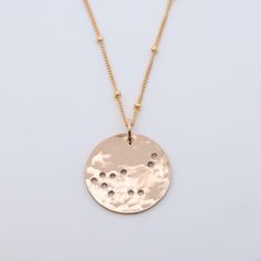 What's your sign? These sweet handmade zodiac necklaces are written in the stars, literally. Strung on a 18 inch chain in the metal of your choice, this coin has tiny dot zodiac star cut outs. Simply select your sign and we'll send you the stars. Need one for a friend? Take a peek at all twelve! 3/4”L Coin on a 18” Chain. Rose Gold Nickel-free Medallion Necklace, Nickel-free Rose Gold Round Charm Necklaces, Nickel-free Round Rose Gold Charm Necklaces, Nickel-free Rose Gold Round Disc Jewelry, Dainty Zodiac Sign Round Pendant Jewelry, Rose Gold Zodiac Sign Round Pendant Necklace, Rose Gold Zodiac Round Pendant Necklace, Dainty Zodiac Sign Round Necklace, Dainty Zodiac Sign Necklace