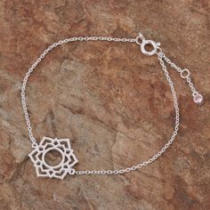 The chakra crown is often related to enlightenment and spiritual forces. Drawing inspiration from this traditional symbol, Thailand's Lalana crafts a stunning sterling silver bracelet featuring a chakra crown pendant. The final touch is in the pink cubic zirconia stone embellishing the extender. Pink Chakra, Crown Pendant, Final Touch, Pendant Bracelet, Sterling Silver Bracelet, Drawing Inspiration, The Pink, Sterling Silver Bracelets, Sterling Silver Pendants