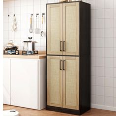 a black and brown cabinet next to a kitchen counter