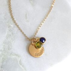 This special charm necklace is created with a mama and dainty birthstone charms.  Available in silver or gold necklace options, this necklace is perfect for everyday and makes a unique gift for mom on Mother's Day! D E T A I L S *6mm genuine natural birthstone *Choose up to 5 birthstones  *12mm mama disc  *100% 14kt Gold-Filled or Sterling Silver  *A high quality delicate link chain with a spring clasp. *Polished to a light satin finish. *Great versatile design for everyday wear. CUSTOM HAND STA Mama Necklace, Unique Gifts For Mom, Gem Necklace, Mom Jewelry, Birthstone Gifts, Mom Necklace, Birthstone Charms, Dainty Necklace, Personalized Necklace