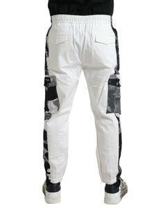 DOLCE & GABBANA Gorgeous, brand new with tags 100% Authentic Dolce & Gabbana cotton blend jogger pants Model: Jogger pants Colour: White Materials: 83% Cotton 15% Polyester 2% Elastane Elastic waist and drawstring closure Logo Details Made in Italy White Jogger Pants, White Cargo Pants, White Joggers, Mens Jogger Pants, Formal Loafers, Italian Craftsmanship, Dolce E Gabbana, Mens Joggers, Dolce And Gabbana Man