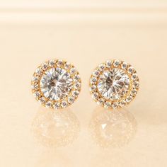 stud earrings, wedding earrings, bridal jewelry, bridal earrings, gold stud earrings ► Spend $200 | Receive 10% OFF Your Order with Code: 10OFF200 ► Please note in your order when your wedding date is Made with the best quality crystals, this These earrings are lightweight and comfortable to wear for long periods of time. MATERIALS + MEASUREMENTS: - .925 Sterling Silver, 14K Gold or Rose Gold over Sterling Silver - Cubic Zirconia pave crystals - Diameter 8 MM - Hypoallergenic post ALSO AVAILABLE Elegant Gold Cluster Earrings With Halo Design, Elegant Gold Earrings With Halo Setting, Gold Earrings With Halo Setting, Elegant Gold Cluster Halo Earrings, Gold Halo Design Cubic Zirconia Earrings, Yellow Gold Halo Cluster Earrings For Wedding, Elegant Gold Diamond Earrings With Halo Setting, Yellow Gold Earrings With Halo Setting For Wedding, Yellow Gold Halo Earrings For Wedding