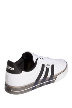 Add comfort to your everyday life. These men's shoes have a canvas upper with 3-Stripes that go around the side walls and come through the translucent midsole. Iconic adidas branding gives these shoes a classic finish.Sizing: True to size. Classic Adidas Sneakers In Synthetic Material, Classic Adidas Synthetic Sneakers, Classic Adidas Sneakers In Synthetic, Adidas Synthetic Sneakers With Rubber Sole, Adidas Sneakers With Contrast Sole For Spring, Classic Synthetic Skate Shoes With Contrast Sole, Classic Synthetic Skate Shoes With Vulcanized Sole, Modern Lace-up Skate Shoes For Spring, Adidas Slip-on Synthetic Sneakers