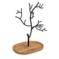 PRICES MAY VARY. TREE DISPLAY: Show off and organize your collection of accessories with the Navaris jewelry stand. The organic tree shape will add a natural touch of whimsy to your bedroom or dressing room. ACCESSORIES ORGANIZER: The sturdy metal "branches" provide the perfect place to hang and hold various sizes of necklaces, bracelets, rings, earrings and watches. The bamboo base doubles as a jewelry dish to hold ear studs and other loose trinkets. PRODUCT DETAILS: Dimensions W x D x H - 7.1" Tree Jewelry Displays, Wooden Jewellery Tree, Handmade Wire Jewelry Stand, Wood Branch Jewelry Holder, Wooden Jewelry Tree, Jewelry Tree Stand, Bamboo Dishes, Jewelry Organizer Stand, Necklace Stand