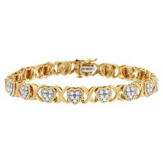 Introducing a breathtaking masterpiece that will steal your heart! This exquisite 14KY Yellow Gold Plated .925 Sterling Silver bracelet showcases a mesmerizing design of intertwining hearts and X links, symbolizing eternal love and unity. Adorned with a dazzling array of 90 round, natural diamonds totaling 1.00 cttw, this bracelet exudes elegance and sophistication. The diamonds, with their I-J color and I3 clarity, shimmer brilliantly in a pave setting, capturing every ray of light. Crafted wit Luxury Yellow Gold Heart Cut Bracelet, Luxury Gold Heart-cut Bracelets, 14k Yellow Gold Heart-shaped Diamond Bracelet, Yellow Gold Heart-shaped Cubic Zirconia Bracelets, Yellow Gold Cubic Zirconia Tarnish-resistant Bracelets, Intertwined Hearts, Ray Of Light, Pave Setting, Diamond Settings