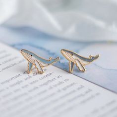 This Stud Earrings item by MissModiDesign has 720 favorites from Etsy shoppers. Ships from Denton, TX. Listed on Jan 16, 2023 Cool Metal Jewelry, Whale Earrings, Enameling Jewelry, Sea Of Love, Fantasy Earrings, Snake Jewelry, Snake Earrings, Steel Post, Trendy Earrings