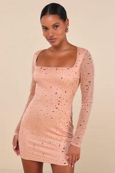 The Lulus Luxe Statement Tan Rhinestone Mesh Long Sleeve Mini Dress knows just how to steal the spotlight! Dazzling rhinestones (in studded and rectangular-cut shapes) adorn stretchy mesh knit as it creates this eye-catching dress with a square neckline, sheer long sleeves, and a darted bodice. The figure-flaunting silhouette continues into a bodycon skirt that finishes at a sexy mini hem. Hidden back zipper/clasp. Fit: This garment fits true to size. Length: Mid-thigh. Size medium measures 32" Steal The Spotlight, Bodycon Skirt, Rhinestone Dress, Sparkly Dress, Mesh Long Sleeve, Body Con Skirt, Long Sleeve Mini, Long Sleeve Mini Dress, Mesh Dress