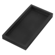 an empty black tray on a white background