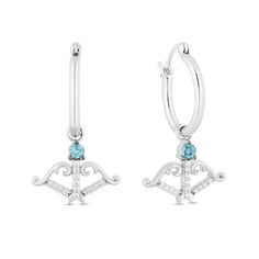 Aim for new style heights with these fanciful blue topaz and diamond bow and arrow drop earrings from the Enchanted Disney Fine Jewelry Collection inspired by Merida. Crafted in sterling silver Each drop showcases a diamond-lined arrow dangle topped with a Swiss blue topaz. Diamond-lined and scrolling ribbons create the bow design. These 1/10 ct. t.w. diamond hoop earrings secure with latch backs. ©Disney Disney Merida, Enchanted Disney, Enchanted Disney Fine Jewelry, Disney Fine Jewelry, Diamond Bows, Bow And Arrow, Bow Arrows, Swiss Blue Topaz, Bow Design